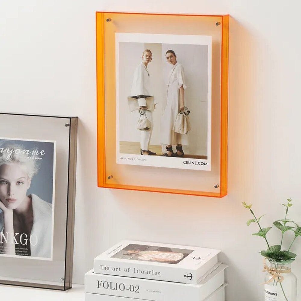 Transparent acrylic photo frame showcasing a floating design, perfect for minimalist display of photos and prints. 0